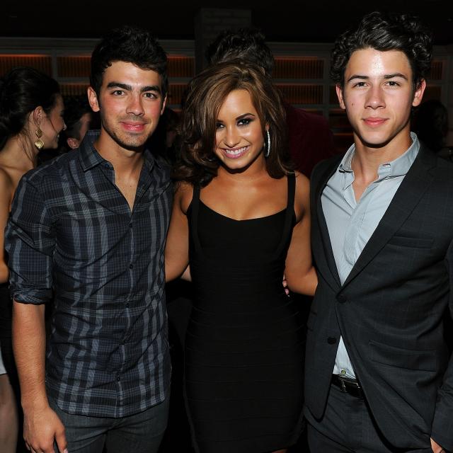 Joe Jonas, Demi Lovato and Nick Jonas in 2010