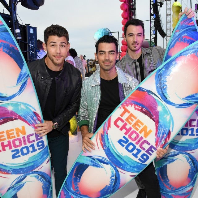 Nick Jonas, Joe Jonas and Kevin Jonas, winners of the Teen Choice Decade Award, at FOX's Teen Choice Awards 2019