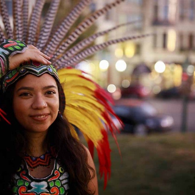 Mexica (Aztec) dancer, Miriam Cortes, of Indianapolis wears traditional costumes after performing at the Monroe County Courthouse during Indigenous Peoples Day in Bloomington. A resolution passed by the Bloomington City Council officially puts Indigenous People's Day on the calendar as a holiday every second Monday of October. 