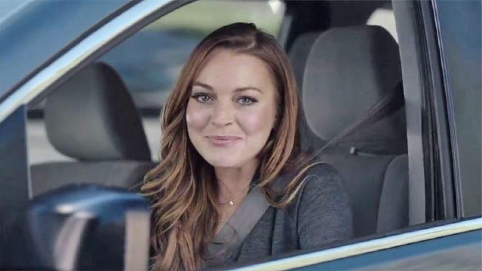 Lindsay Lohan Teases Super Bowl Car Insurance Ad �Time to
