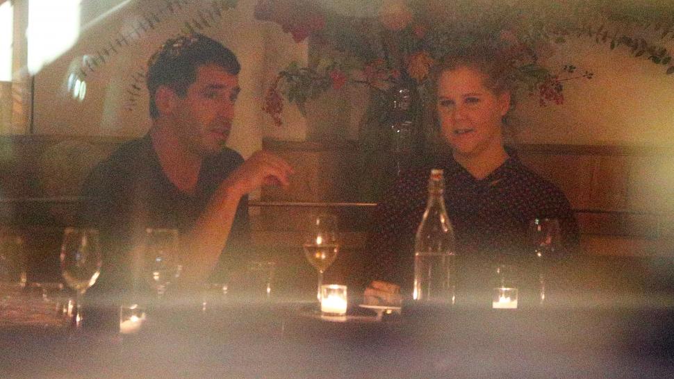 Amy Schumer and Chris Fisher.