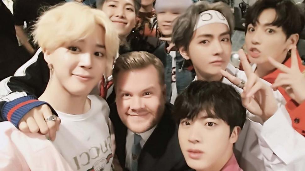 BTS poses with James Corden backstage at 'The Late Late Show'