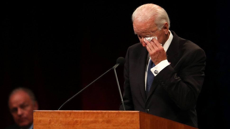 Joe Biden wipes his eye as he speaks during a memorial service to celebrate the life of of U.S. Sen. John McCain at the North Phoenix Baptist Church on August 30, 2018 in Phoenix, Arizona. 