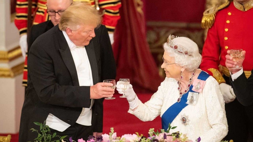 Queen Elizabeth II toasts with Donald Trump during a state dinner at Buckingham Palace on June 3