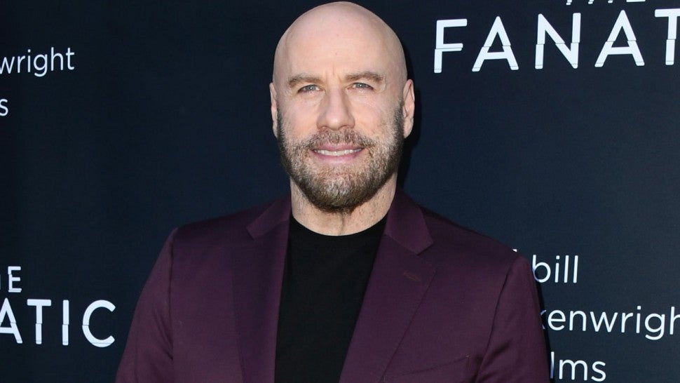 John Travolta Makes Surprise Appearance at Premio Lo ...