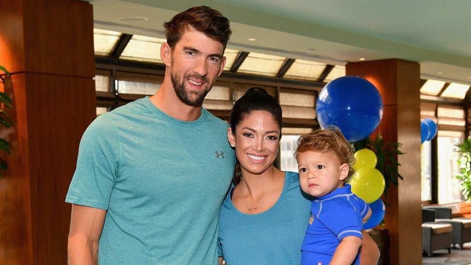 Michael Phelps, Nicole Johnson and son Boomer in august 2017
