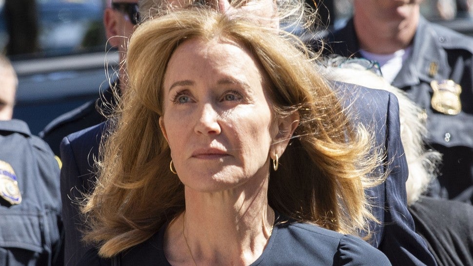 Felicity Huffman makes her way to the entrance of the John Joseph Moakley United States Courthouse September 13, 2019 in Boston, where she will be sentenced for her role in the College Admissions scandal.