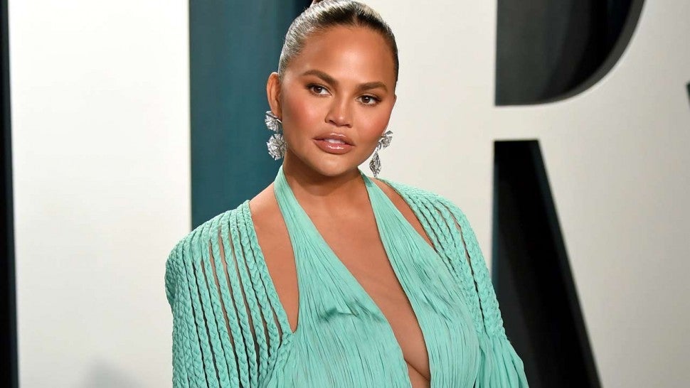 Chrissy Teigen Reveals She Had Plastic Surgery at Age 20: 'I Did My Boobs' | Entertainment Tonight
