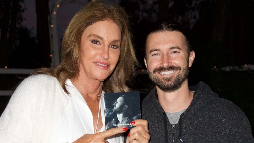 Caitlyn Jenner and Brandon Jenner pose for a photo at the Brandon Jenner Record Release Party For "Burning Ground" on November 19, 2016 in Malibu, California.