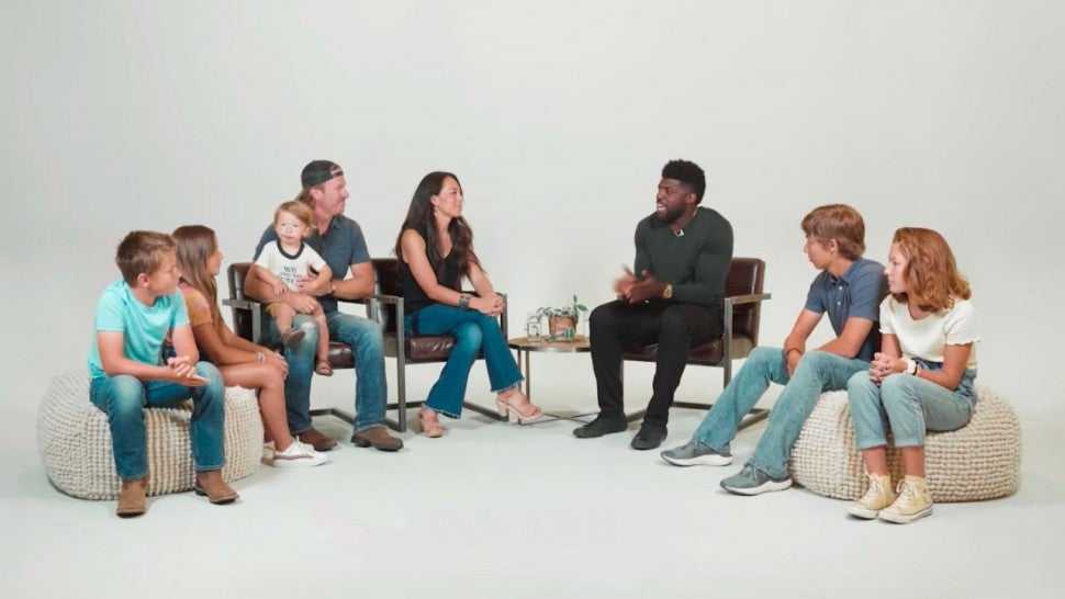 Chip and Joanna Gaines and their kids with Emmanuel Acho