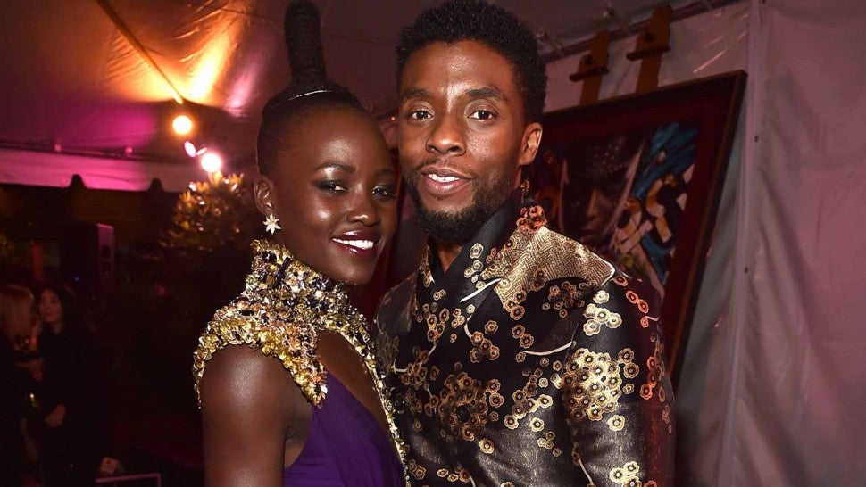 Lupita Nyong'o (L) and Chadwick Boseman at the Los Angeles World Premiere of Marvel Studios' BLACK PANTHER at Dolby Theatre on January 29, 2018 in Hollywood, California.
