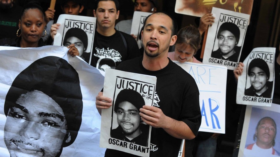 Aidge Patterson of the LA Coalition for Justice for Oscar Grant leads a protest rally outside a pretrial hearing for Johannes Mehserle, the former Bay Area Rapid Transit officer charged with murder in the shooting death of Grant in Oakland, California last year, at the Criminal Courts Building in Los Angeles on March 26, 2010.