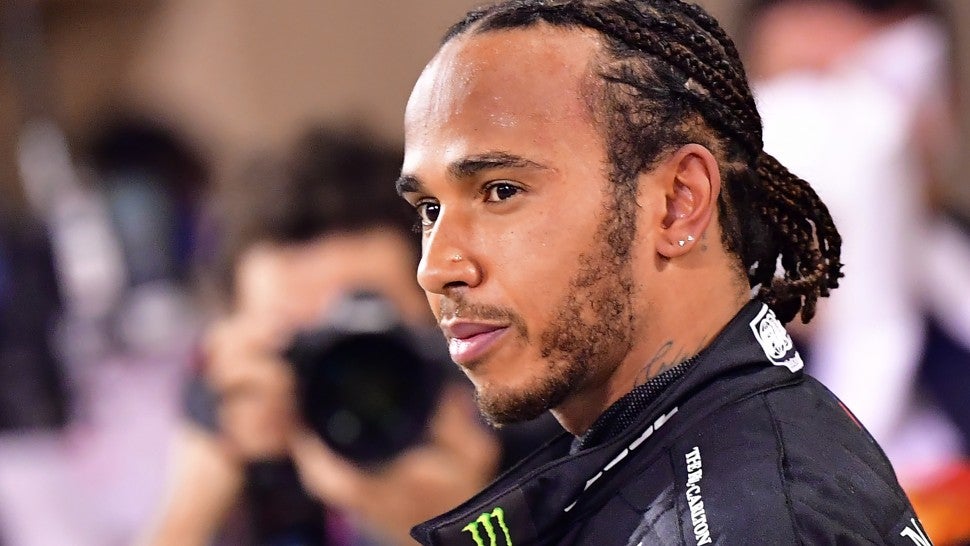 Mercedes' British driver Lewis Hamilton looks on after winning the Bahrain Formula One Grand Prix at the Bahrain International Circuit in the city of Sakhir on November 29, 2020.