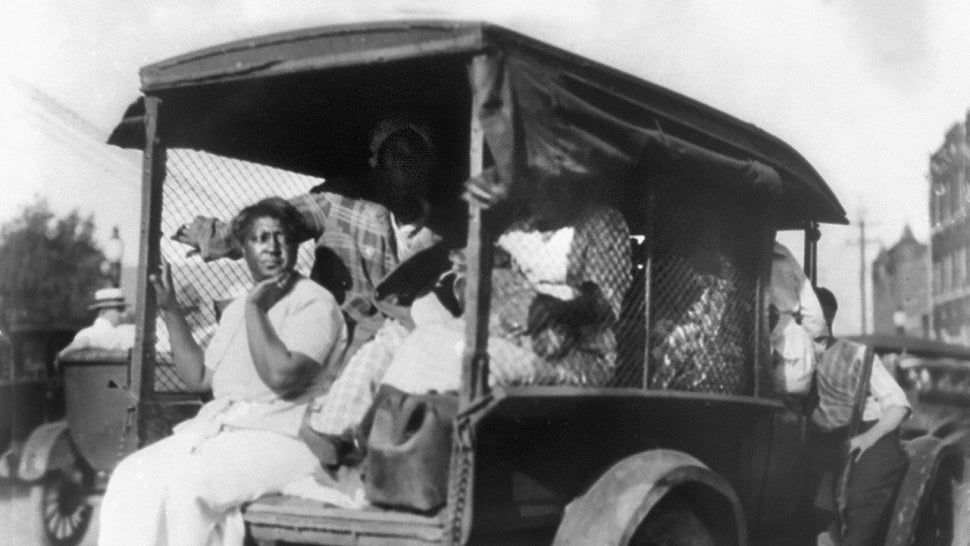Rear View of Truck carrying African Americans during Riot, Tulsa, Oklahoma, USA, Alvin C. Krupnick Co., 1921.