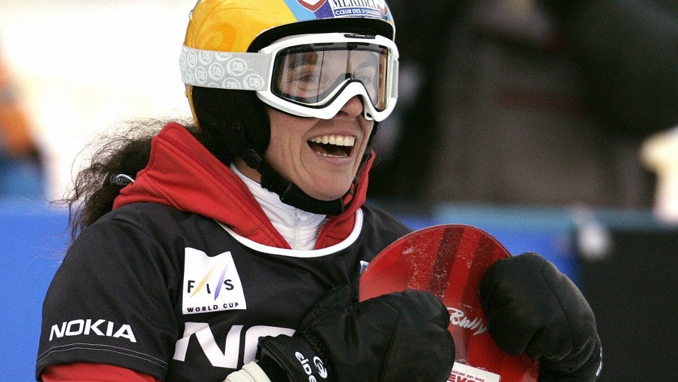 Julie Pomagalski of France celebrates after she took third place in the women's Snowboard Parallel Slalom in Bad Gastein 21 December 2006.