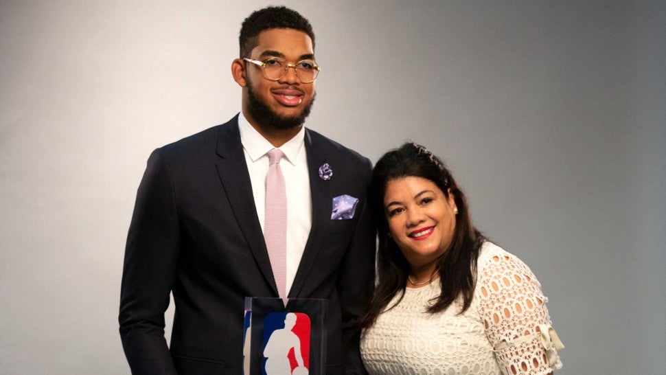 Cruz posed with her son as he had his official pictures taken by team photographer David Sherman after being named NBA Rookie of the Year in 2016