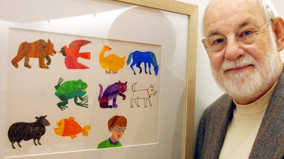 Artist Eric Carle, an illustrator and author of children's books, with his work from the book, "The Mixed Up Chameleon." Carle was instrumental in the planning and building of the museum.
