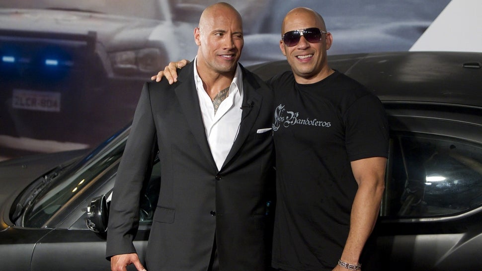 Dwayne Johnson (The Rock) and Vin Diesel pose for photographers during the premiere of the movie "Fast and Furious 5" at Cinepolis Lagoon on April 15, 2011 in Rio de Janeiro, Brazil. 