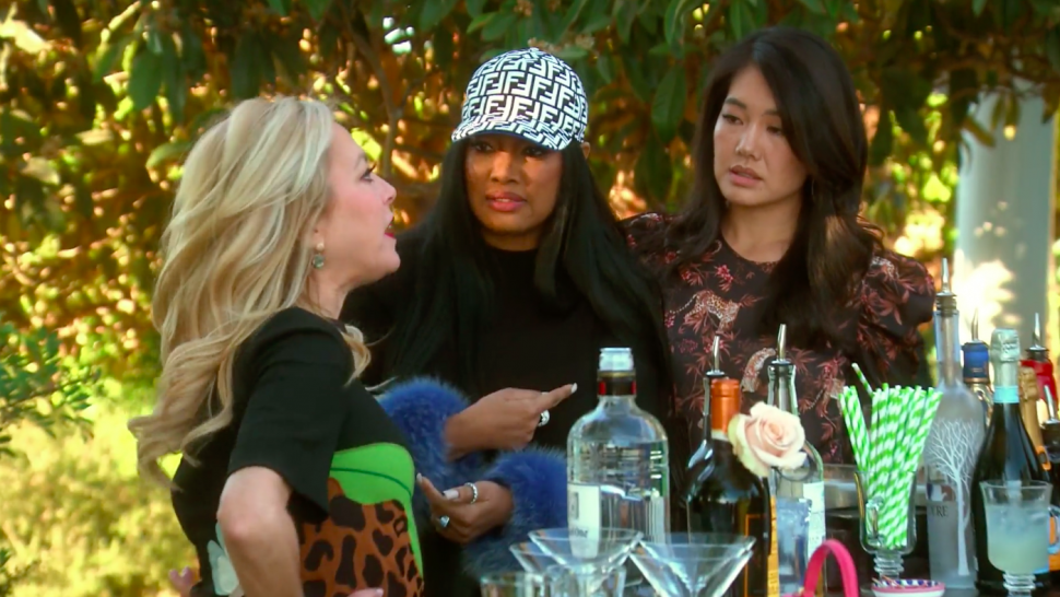 Garcelle Beauvais attempts to mediate between Sutton Stracke and Crystal Kung Minkoff on The Real Housewives of Beverly Hills