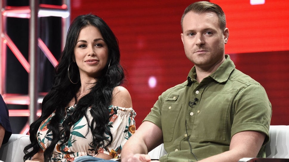 Paola Mayfield and Russ Mayfield of '90 Day Fiance: Happily Ever After?' speak onstage during the TLC - '90 Day Fiance' franchise portion of the Discovery Communications Summer TCA Event 2018 at The Beverly Hilton Hotel on July 26, 2018 in Beverly Hills, California. 