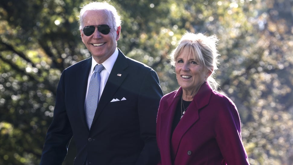 U.S. President Joe Biden and First Lady Jill Biden walk on the South Lawn of the White House after arriving on Marine One in Washington, D.C., U.S., on Monday, Nov. 8, 2021.