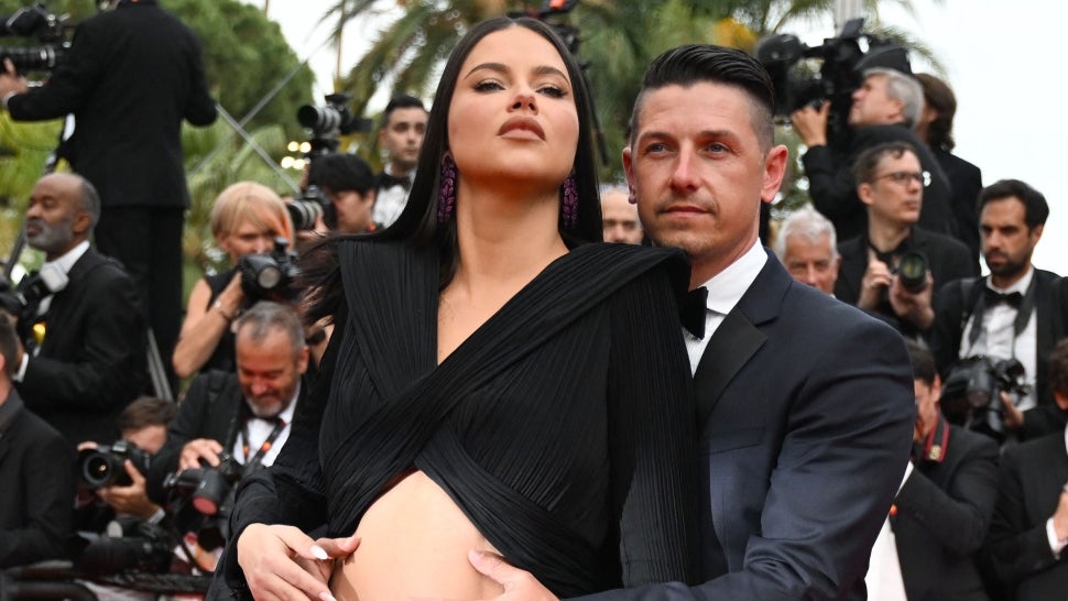 Adriana Lima Bares Baby Bump on Cannes Red Carpet in Cut-Out Gown You Have to See for Yourself.jpg