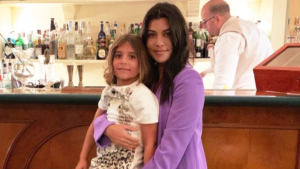 Kourtney Kardashian's Daughter Penelope Responds to Her Mom's PDA With Travis Barker.jpg
