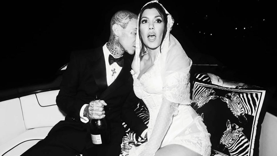 Travis Barker Showers Kourtney Kardashian With PDA in New Wedding Photos.jpg
