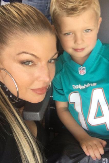 Fergie and Axl watching Miami Dolphins