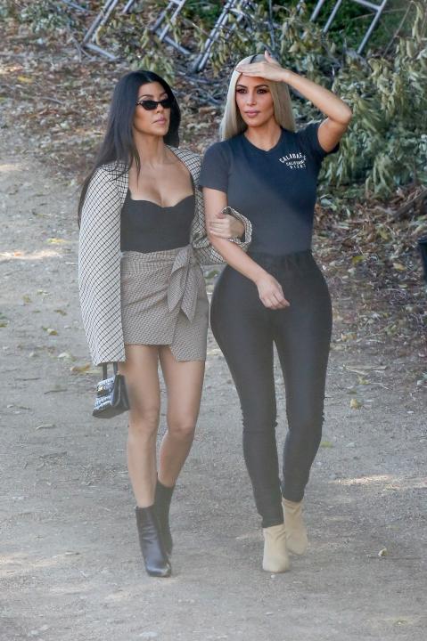 Kourtney and Kim Kardashian at xmas tree shop