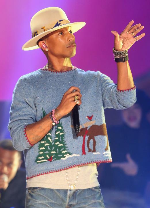 Pharrell Williams performs onstage during A VERY GRAMMY CHRISTMAS