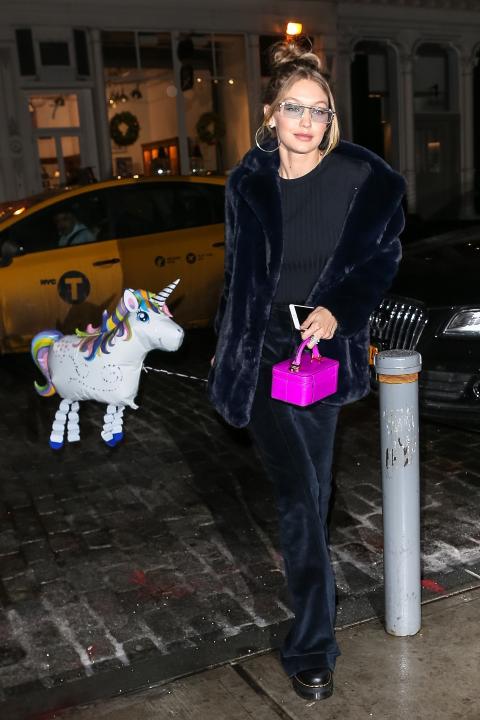 Gigi Hadid and her pet unicorn balloon
