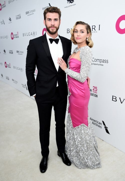 Liam Hemsworth and Miley Cyrus at Elton John party