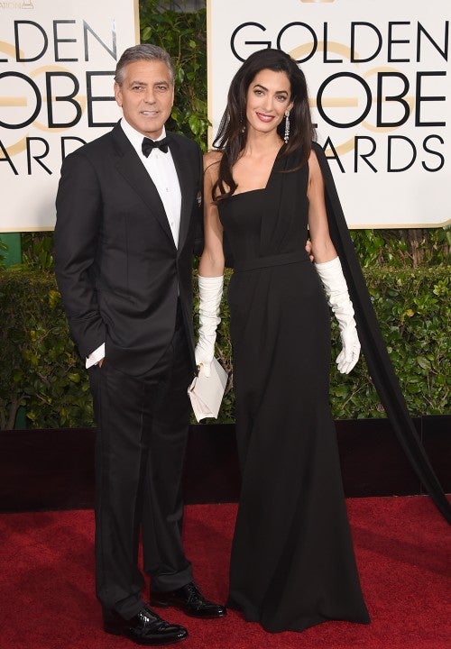 Actor George Clooney (L) and Amal Clooney attend the 72nd Annual Golden Globe Awards at The Beverly Hilton Hotel on January 11, 2015 in Beverly Hills, California.