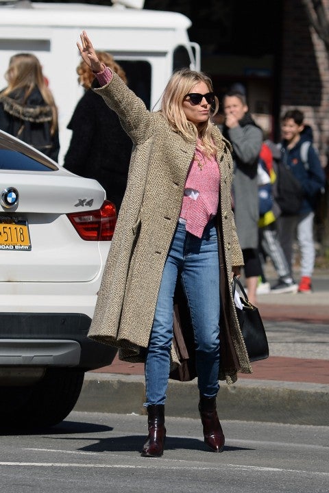 Sienna Miller hails a cab in NYC