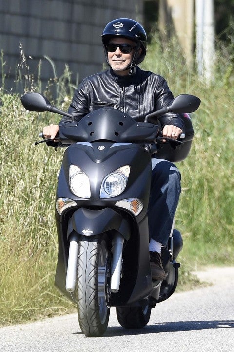 George Clooney on scooter in Italy