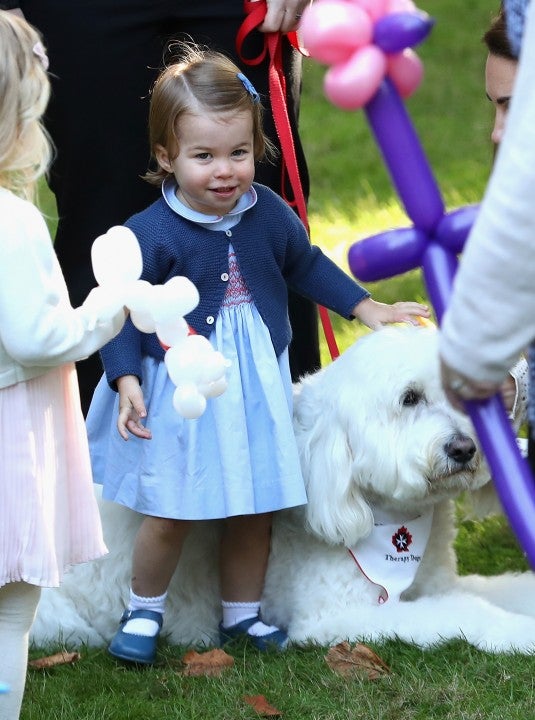 Princess Charlotte meets a dog named Moose in Canada