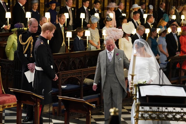 Prince Harry, Prince Charles and Meghan Markle at altar