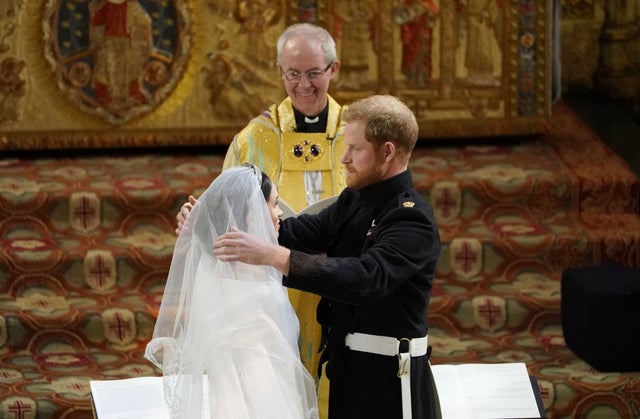 Prince Harry lifts Meghan Markle's veil