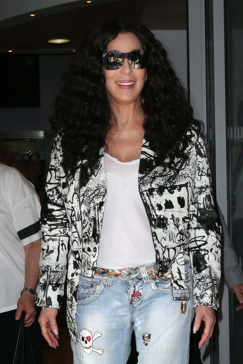 Cher smiles to fans outside BBC Radio 2 Studios in London, England, on July 17