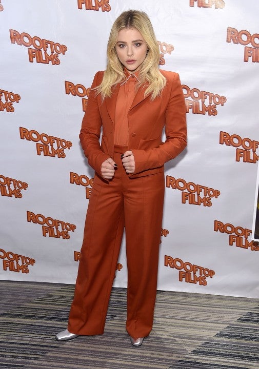 Chloe Grace Moretz in orange suit 