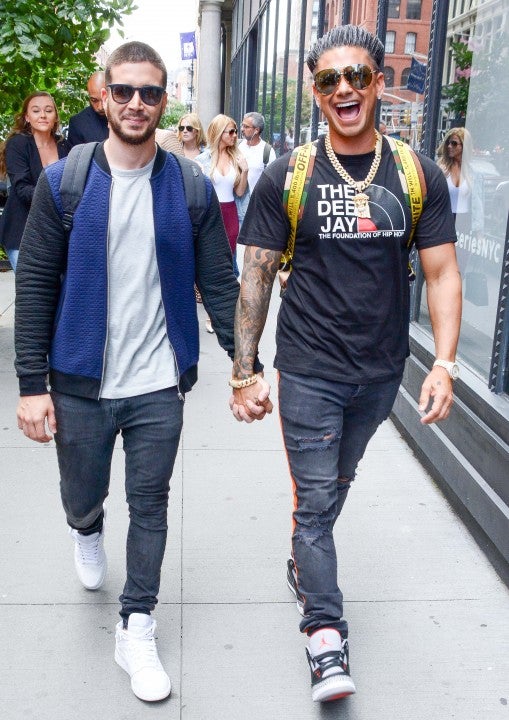 Vinny Guadagnino and DJ Pauly D hold hands in nyc