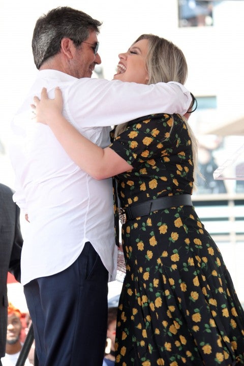 Simon Cowell and Kelly Clarkson at walk of fame ceremony