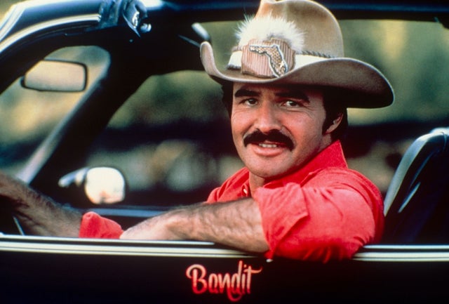 Burt Reynolds in Smoky & the bandit car circa 1970