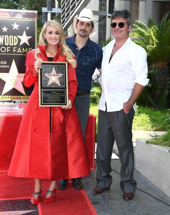 Carrie Underwood, Brad Paisley and Simon Cowell at her Hollywood Walk of Fame star ceremony on Sept. 20.