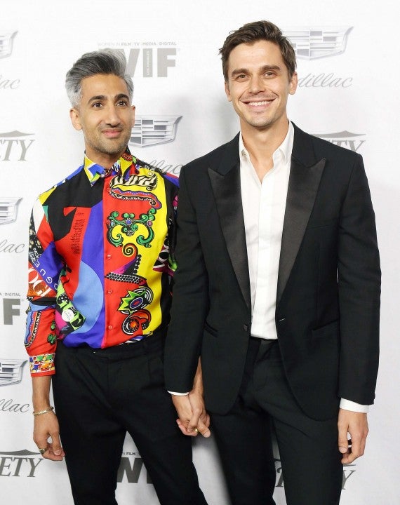 Tan France and Antoni Porowski at a pre-Emmys party on Sept. 15