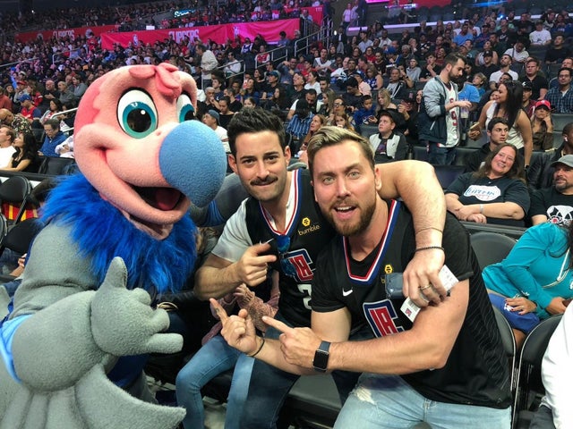 Lance Bass and husband at clippers game