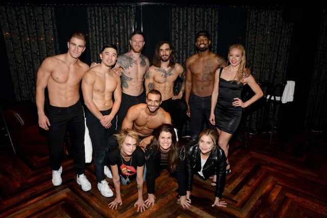 Cara Delevingne and Ashley Benson with the cast of 'Magic Mike Live' in Las Vegas on Oct. 19.