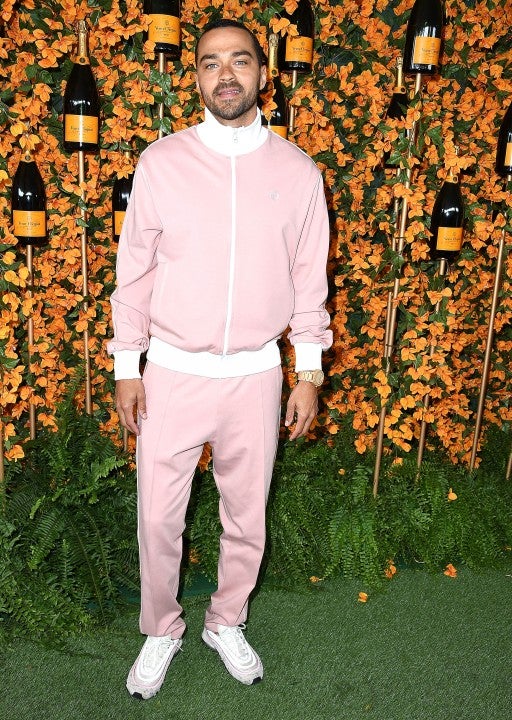 Jesse Williams in pink tracksuit