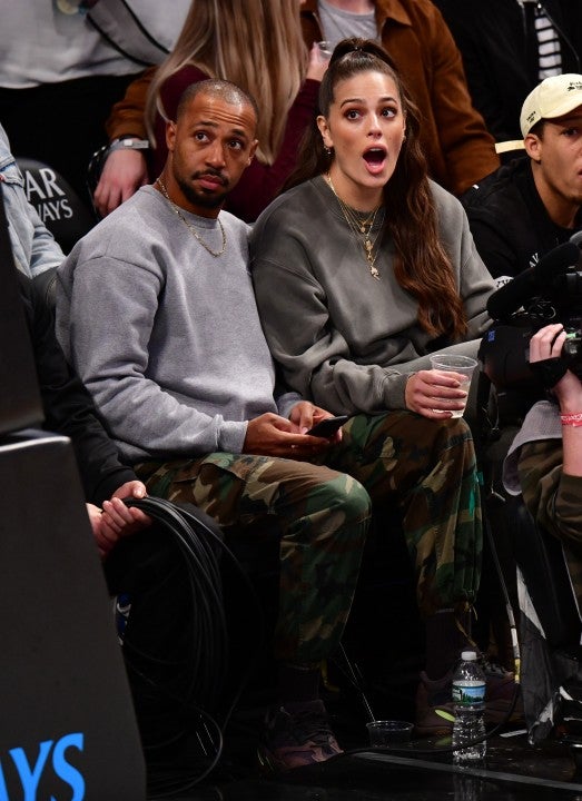 Ashley Graham and husband at Nets/Rockets game